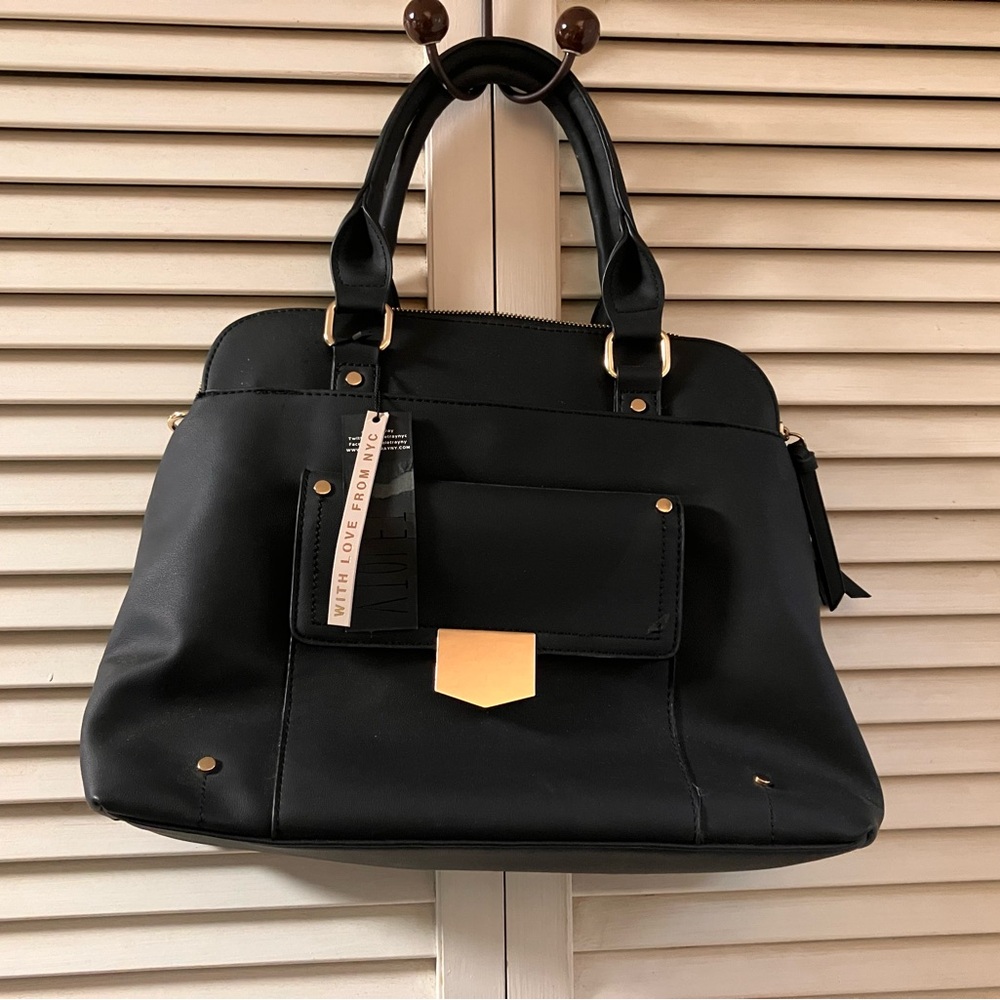 Sophisticated Black Leather Satchel with Structured Design